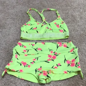Pink sport XS floral two piece sports bra and shorts athletic set.