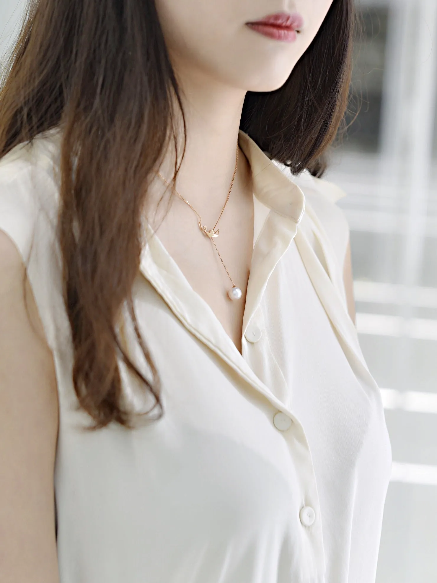 "Origaminx Boat" 18K gold and Akoya pearl, origami-shaped necklace