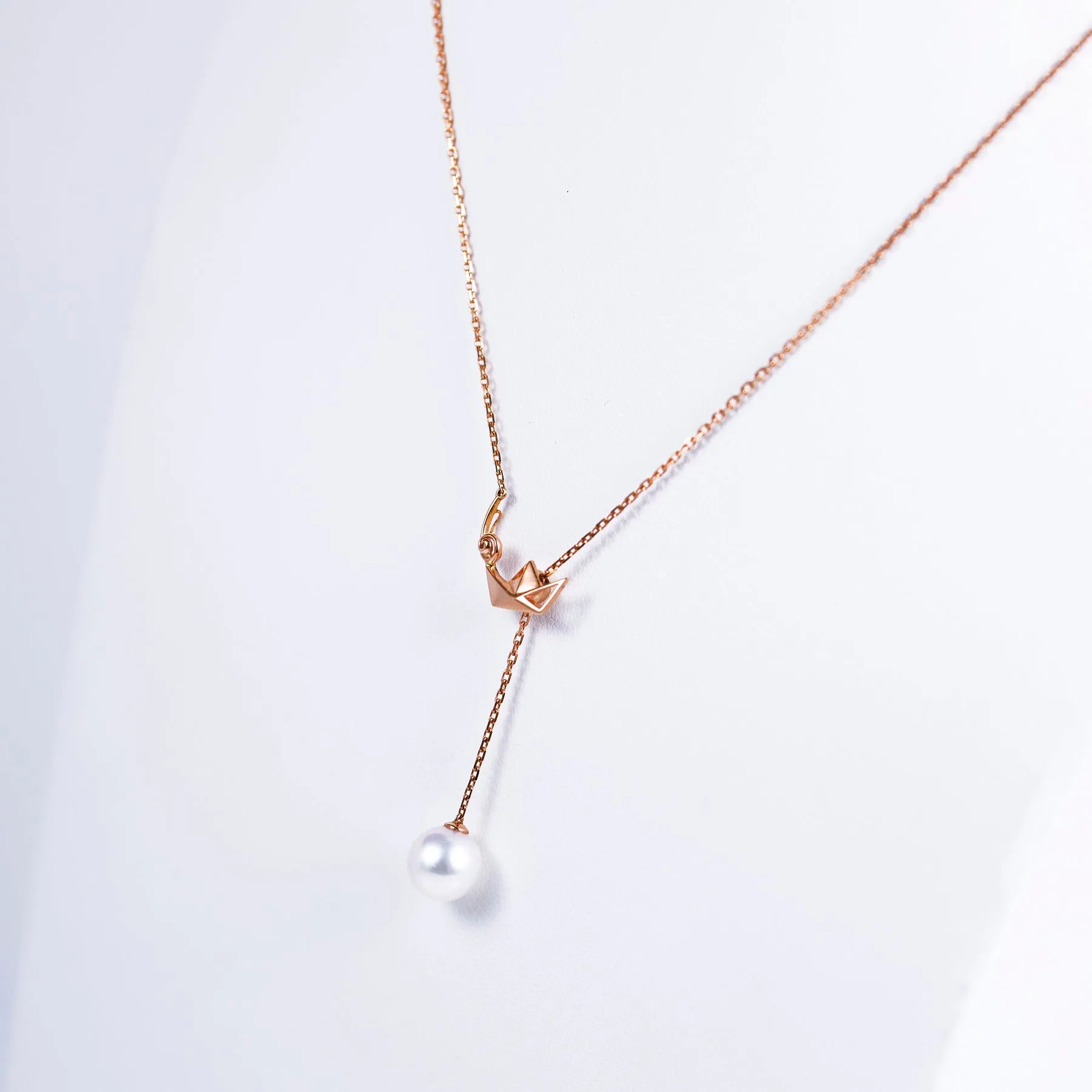 "Origaminx Boat" 18K gold and Akoya pearl, origami-shaped necklace