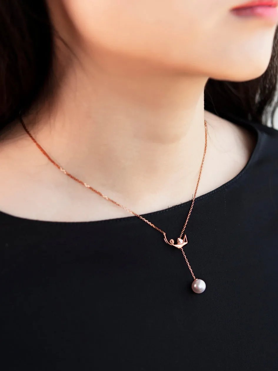 "Origaminx Boat" 18K gold and Akoya pearl, origami-shaped necklace