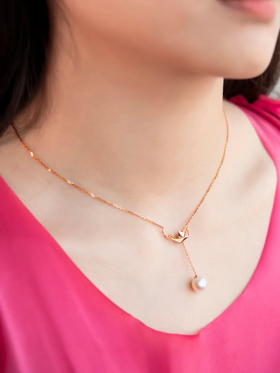 "Origaminx Boat" 18K gold and Akoya pearl, origami-shaped necklace